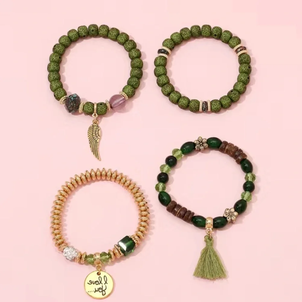 Green tassel and wing charm beaded‎ bracelet set